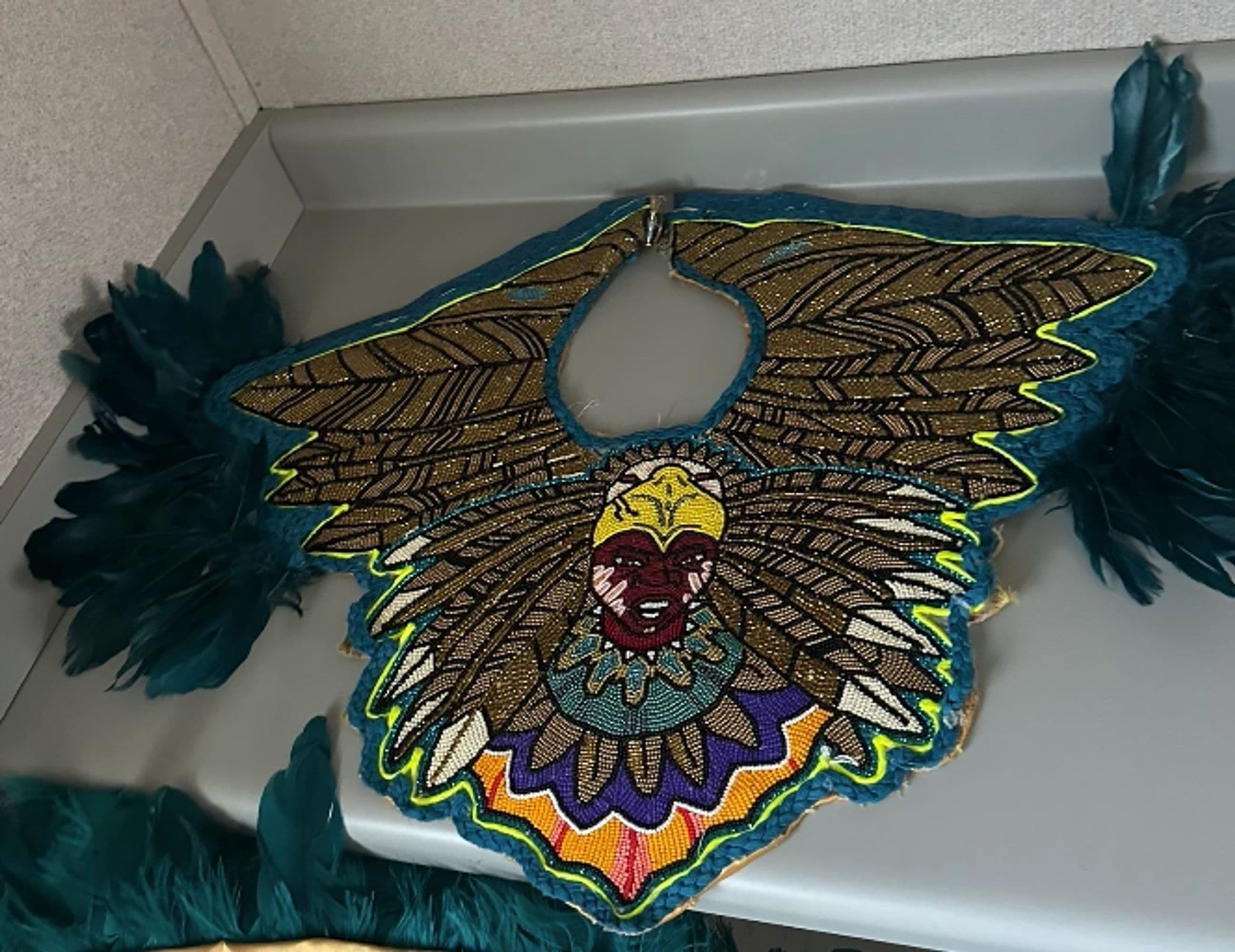 Big Chief's suit detail